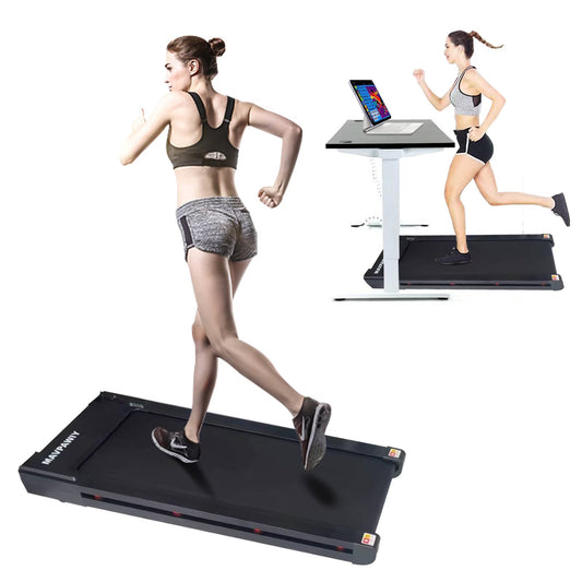 Woman running on a treadmill with a desk attachment in the background